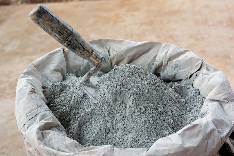 Cement,Powder,And,Trowel,Put,In,Bag,Package